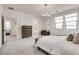 Main bedroom with king bed and en-suite bath at 540 Front Range Ln, North Las Vegas, NV 89084