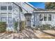 Inviting front entrance with a charming gate at 7000 W Rome Blvd, Las Vegas, NV 89131