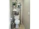 Small bathroom with a toilet and over-toilet shelving at 7914 Torreys Peak St, Las Vegas, NV 89166