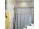 Simple bathroom with shower/tub combo and gray shower curtain at 7914 Torreys Peak St, Las Vegas, NV 89166