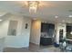 View of kitchen from second floor with dark cabinets and island at 7914 Torreys Peak St, Las Vegas, NV 89166