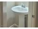 Convenient powder room with pedestal sink at 7914 Torreys Peak St, Las Vegas, NV 89166