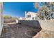 Landscaped backyard with flagstone patio and block wall at 8214 Mt Brodie Cir, Las Vegas, NV 89145