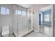 Updated bathroom with a walk-in shower and access to bedroom at 8214 Mt Brodie Cir, Las Vegas, NV 89145