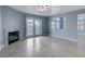 Living room with fireplace and view into kitchen area at 8214 Mt Brodie Cir, Las Vegas, NV 89145