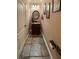 Elegant powder room with dark wood vanity and tile flooring at 9012 Alpine Peaks Ave, Las Vegas, NV 89147