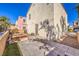 Private backyard with patio and raised garden beds at 9157 Chenille Ct, Las Vegas, NV 89149