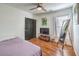 Bedroom with queen bed, large mirror, and TV at 9157 Chenille Ct, Las Vegas, NV 89149