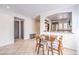 Bright dining area with kitchen view and modern table set at 9157 Chenille Ct, Las Vegas, NV 89149