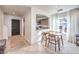 Bright dining area with kitchen view and modern table set at 9157 Chenille Ct, Las Vegas, NV 89149