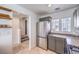 Kitchen with stainless steel appliances and view to hallway at 9157 Chenille Ct, Las Vegas, NV 89149