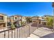 Community view from private patio with wrought iron railings at 9157 Chenille Ct, Las Vegas, NV 89149