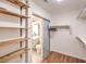 Large walk-in closet with built-in shelving and hanging rods at 9157 Chenille Ct, Las Vegas, NV 89149