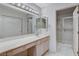 Bathroom boasts a large vanity and shower/tub combo at 9452 Gold Mountain Dr, Las Vegas, NV 89134