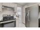 Kitchen with stainless steel appliances and white cabinets at 9452 Gold Mountain Dr, Las Vegas, NV 89134