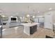 Spacious kitchen with an island, stainless steel appliances, and open layout to the Gathering room at 9753 Russian Hill St, Las Vegas, NV 89141