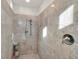 Walk-in shower with marble tile and dual shower heads at 9753 Russian Hill St, Las Vegas, NV 89141