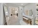 Elegant vanity area with large mirror and seating at 9753 Russian Hill St, Las Vegas, NV 89141