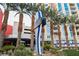 High-rise building entrance with signage and landscaping at 200 W Sahara Ave # 1807, Las Vegas, NV 89102