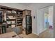 Custom closet features integrated washer/dryer and leads into a bright, modern bathroom at 2111 Bogart Ct, Las Vegas, NV 89117