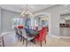 Cozy dining room with seating for eight, brightened by natural light, for casual meals at 2111 Bogart Ct, Las Vegas, NV 89117