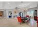 Spacious dining room with chandelier and natural light, perfect for hosting gatherings with friends at 2111 Bogart Ct, Las Vegas, NV 89117