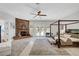 Spacious main bedroom featuring a fireplace, a seating area, and access to the backyard at 2111 Bogart Ct, Las Vegas, NV 89117