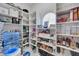 Well-organized pantry with custom shelving providing ample storage space for food and kitchen essentials at 2111 Bogart Ct, Las Vegas, NV 89117