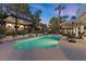 Resort-style pool with spa and outdoor kitchen at 2225 Versailles Ct, Henderson, NV 89074