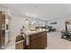 Modern kitchen with stainless steel appliances and island at 318 Brockbank Pl, Henderson, NV 89011