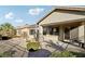 Backyard view of patio and house exterior at 3455 Halter Dr, Las Vegas, NV 89122