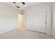 Bedroom with double door closet and neutral colored carpet at 3455 Halter Dr, Las Vegas, NV 89122