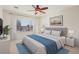 Main bedroom with plush bed and ample natural light at 3455 Halter Dr, Las Vegas, NV 89122