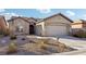 Single-story house with landscaped front yard and two-car garage at 3455 Halter Dr, Las Vegas, NV 89122