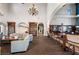 Spacious clubhouse featuring comfortable seating, billiard table, and elegant chandelier at 3709 Citrus Heights Ave, North Las Vegas, NV 89081