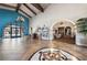 Spacious clubhouse interior featuring a grand entrance, tiled floors, and stylish decor, perfect for community gatherings at 3709 Citrus Heights Ave, North Las Vegas, NV 89081