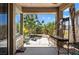 Comfortable covered patio overlooking the landscaped backyard, perfect for enjoying the outdoors in any weather at 3709 Citrus Heights Ave, North Las Vegas, NV 89081