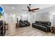Relaxing living room with sleek flooring, providing a comfortable and inviting space at 3709 Citrus Heights Ave, North Las Vegas, NV 89081