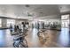 Well-equipped gym featuring modern exercise machines, weights, and large mirrors for a complete workout experience at 480 Heritage Bridge Ave, Henderson, NV 89011