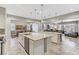Bright kitchen featuring double islands, stainless steel appliances, and an open-concept floorplan at 480 Heritage Bridge Ave, Henderson, NV 89011