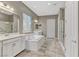 This main bathroom features double sinks, a tub, and a separate shower at 480 Heritage Bridge Ave, Henderson, NV 89011