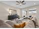 Relaxing living room with sectional sofa and natural light at 12730 Coastline Shadow St, Las Vegas, NV 89141