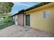Charming home exterior with secure front door and tidy landscaping at 155 E Van Wagenen St, Henderson, NV 89015