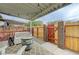 Charming covered patio with a decorative barrel table and comfortable seating at 155 E Van Wagenen St, Henderson, NV 89015