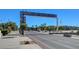 Gateway to Water Street District with landscaped median and clear blue skies at 155 E Van Wagenen St, Henderson, NV 89015