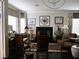 Elegant living room featuring a fireplace and comfortable seating at 1609 Hidden Spring Dr, Las Vegas, NV 89117