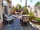 Relaxing patio area with seating and a dining table at 1609 Hidden Spring Dr, Las Vegas, NV 89117