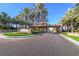 Grand Legacy community entrance with gated access and lush landscaping at 1849 Indian Bend Dr, Henderson, NV 89074