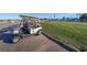 Golf carts parked near a green golf course at 1849 Indian Bend Dr, Henderson, NV 89074