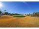 Beautiful golf course with a lush green and golden fairways at 1849 Indian Bend Dr, Henderson, NV 89074